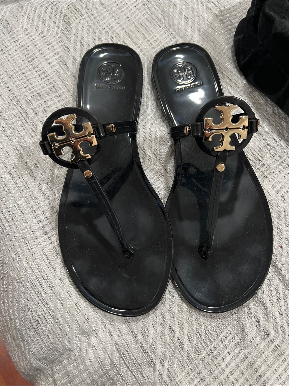 Tory Burch Black Jelly Thong Sandals with Gold Logo Accent